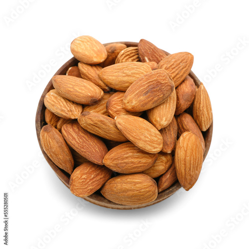 Bowl of tasty almonds on white background