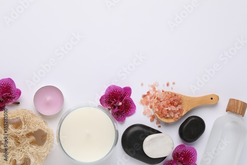 Flat lay composition with different spa products on white background  space for text