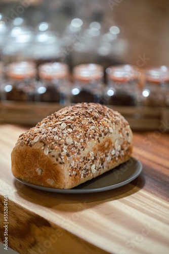 Healthy wholemeal bread on wooden table.