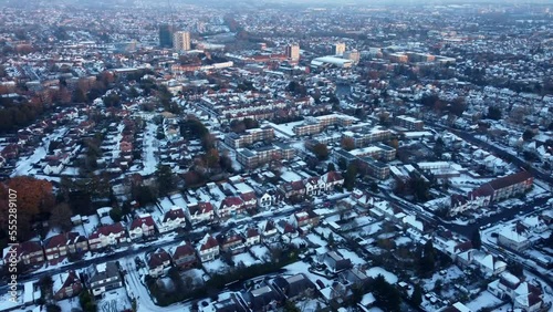 Aerial view city in England covered in white snow during Christmas photo