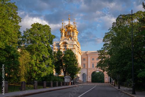 View of the Church of the Ascension of Christ-the palace church of the Catherine Palace and the arch of the Pushkin Memorial Museum-Lyceum in Tsarskoye Selo on a summer day. Pushkin, St. Petersburg photo