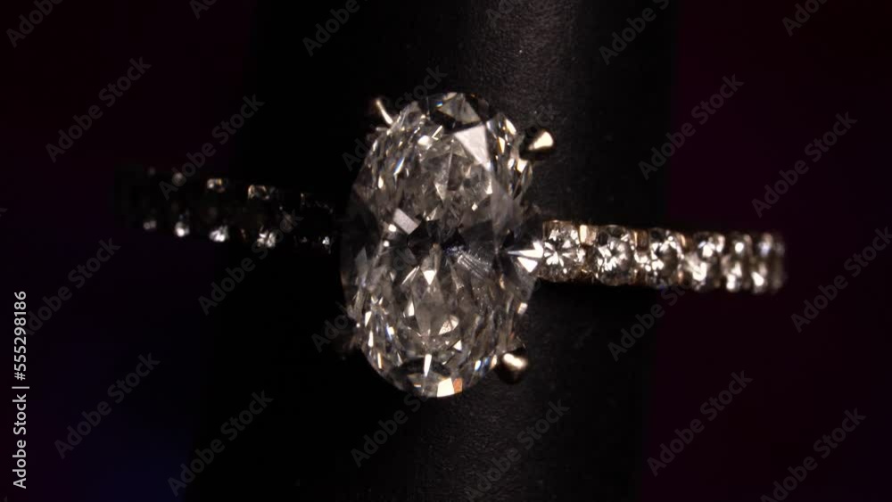 Precious Solitaire Diamond Ring On Black Background. - zoom out Precious Solitaire Diamond Ring On Black Background. - zoom out