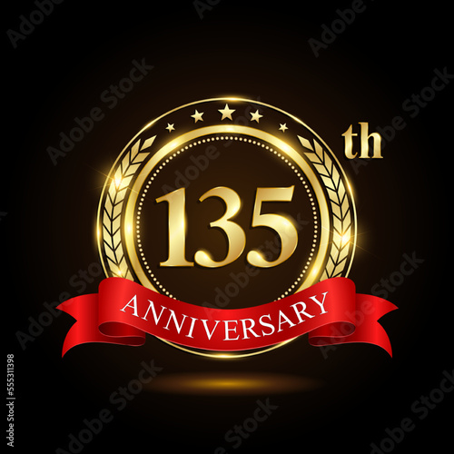 135th Anniversary. Golden Anniversary Emblem Design with shiny ring and red ribbon, Laurel wrath isolated on black background. Logo Vector Illustration
