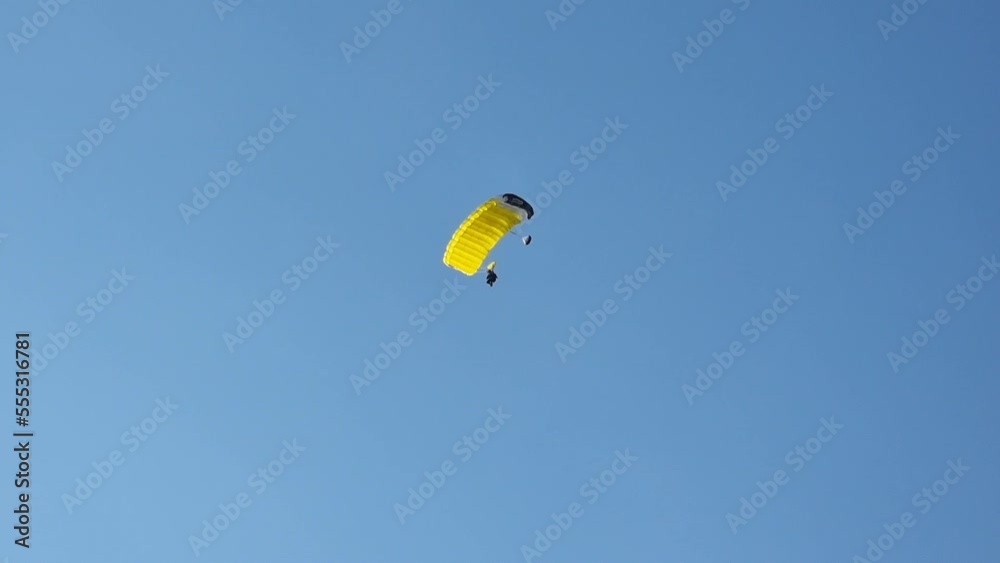 An invisible skydiver descending on a parachute An invisible skydiver descending on a parachute