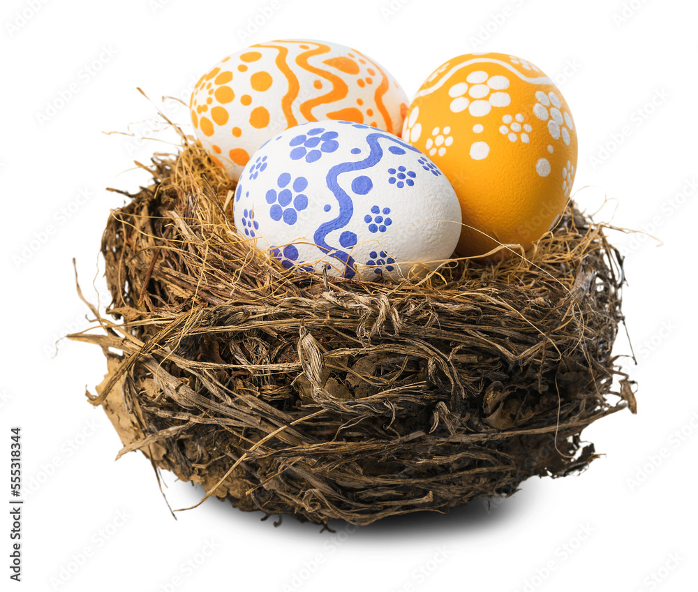 Colorfully painted easter egg in the nest