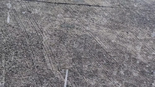 Outdoor rainstorm falling on old concrete floor