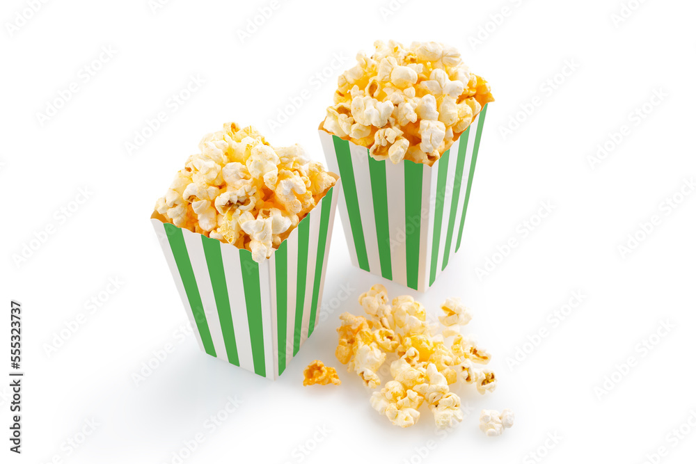 Two green white striped carton buckets with tasty cheese popcorn, isolated on white background. Movies, cinema and entertainment concept.