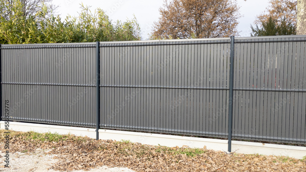 street wall fence modern barrier grey house protection garden access home  Stock-Foto | Adobe Stock
