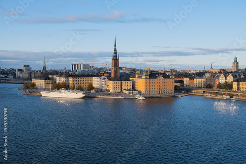 Boat staying at Lake Mälaren near the Riddarholmen Church in Stockholm, Sweden