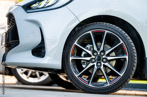 sports car wheels, low profile tires on aluminum rims, closeup