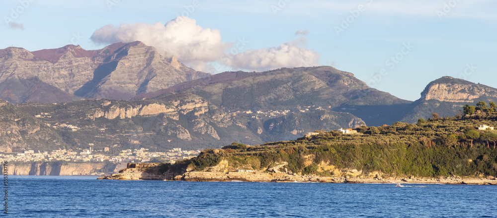 Rocky Coast and Homes near Touristic Town, Sorrento, Italy. Amalfi Coast. Sunny Evening