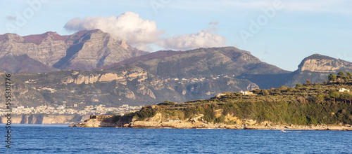 Rocky Coast and Homes near Touristic Town, Sorrento, Italy. Amalfi Coast. Sunny Evening