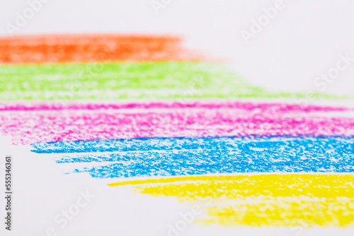 Use crayons to paint white paper in various colors
