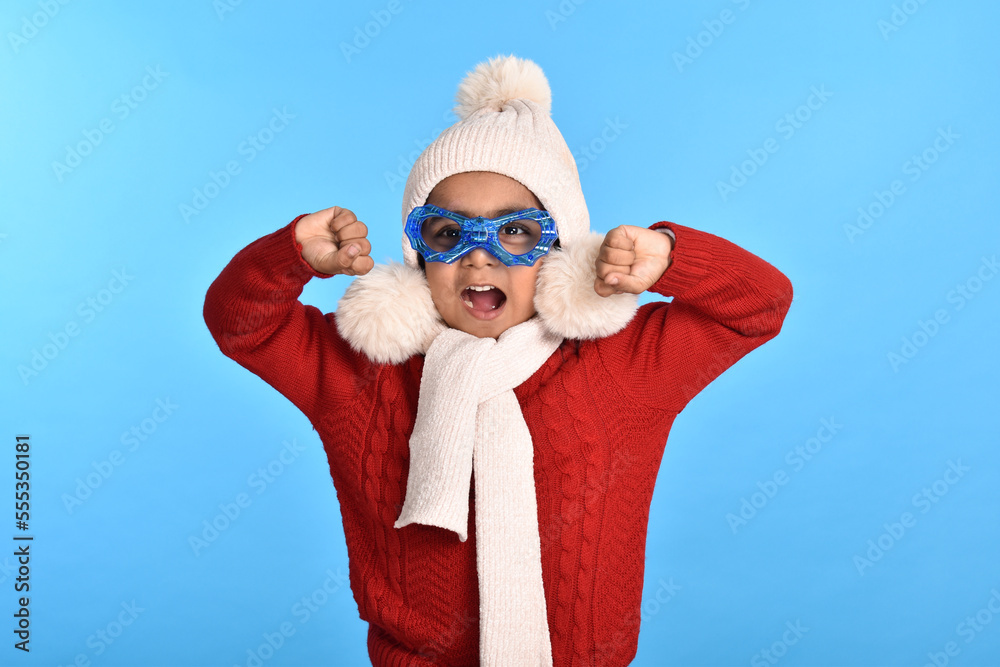 Fototapeta premium child wearing glasses and winter clothes