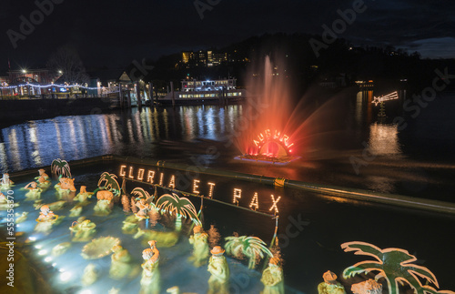 Christmas crib submerged and illuminated by colored lights in the water of Lake Maggiore in Laveno