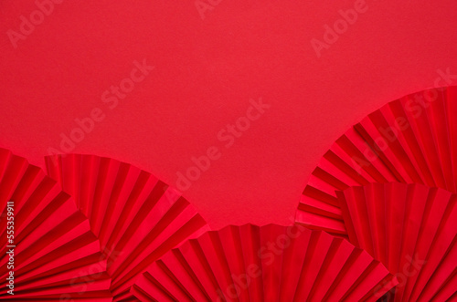 Chinese New Year 2023 .Decor pattern fan on red background. Red paper fans .Lunar New Year banner template.  Lunar New Year chinese banner