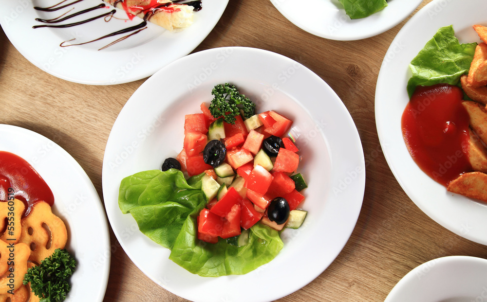 a wide selection of delicious meals on the table in the restaurant