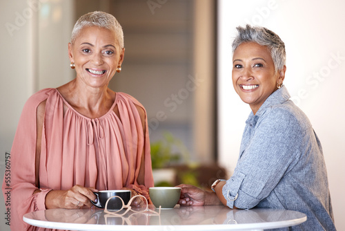 Portrait, friends and senior women with coffee, bonding and retirement. Mature ladies, females and cafe for tea, smile and loving together for reunion, chatting and conversation with gossip and relax
