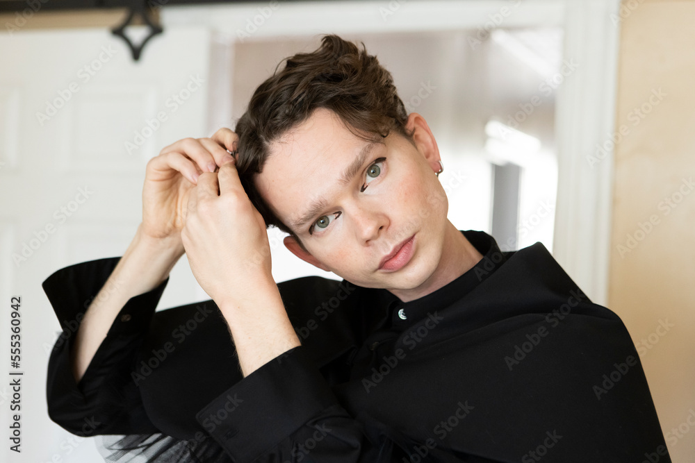 close up portrait of non-binary caucasian person wearing eyeliner close up portrait of non-binary caucasian person wearing eyeliner