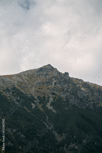 High-angle view of mountain landscape and lake at vibrant sunset. Beautiful non-urban landscape.