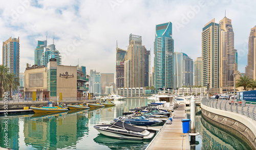 DUBAI, UAE - APRIL 22, 2017: The yachts and promenade of Marina.
