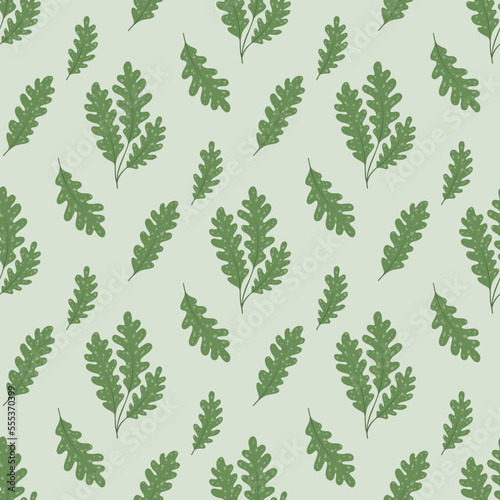 Seamless pattern with spotted leaves. Oak leaves