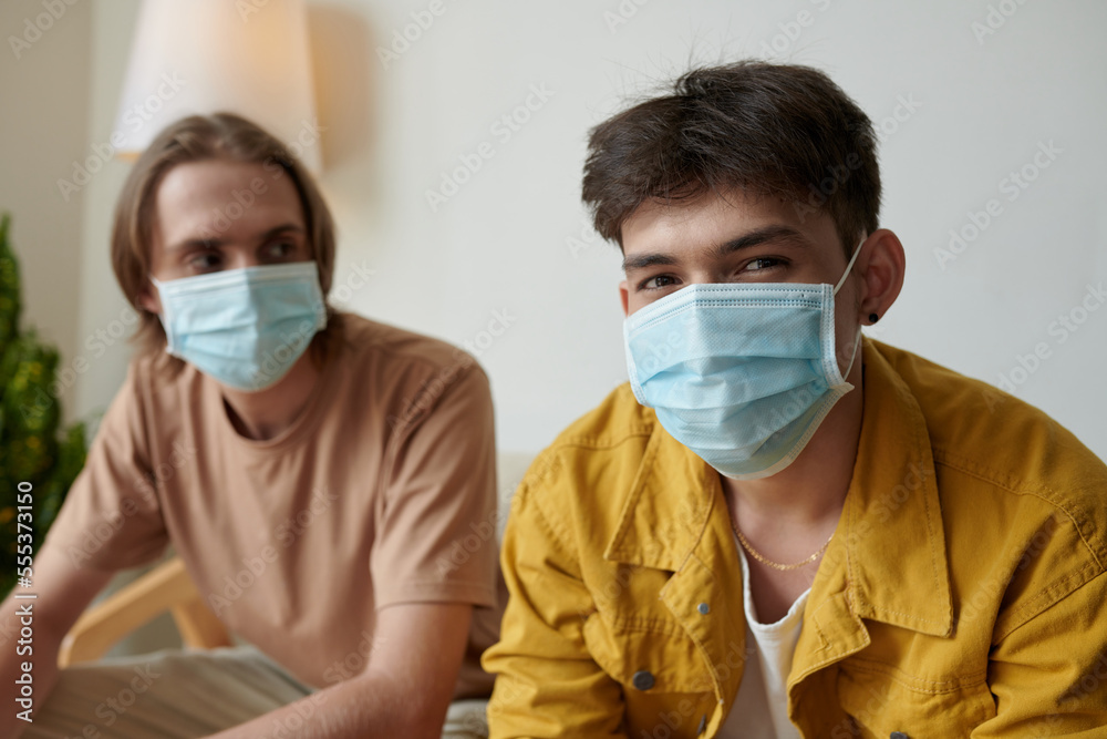 Portrait of young college students wearing medical masks