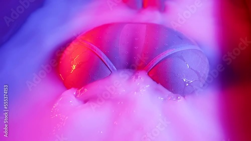 close-up of an elegant female ass in underwear bathing in a milk bath for rejuvenation photo