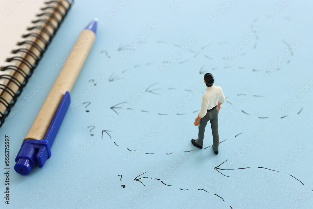 Concept image of people thinking about solving a problem and looking for a right way Concept image of people thinking about solving a problem and looking for a right way