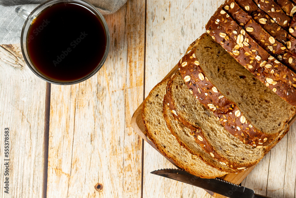 sliced wholemeal bread with cereal with coffee