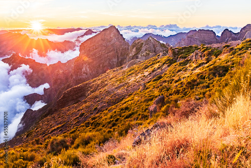sunset over the mountains, Madeira, Portugal. Clouds over the valley. Pico do Arieiro mountain