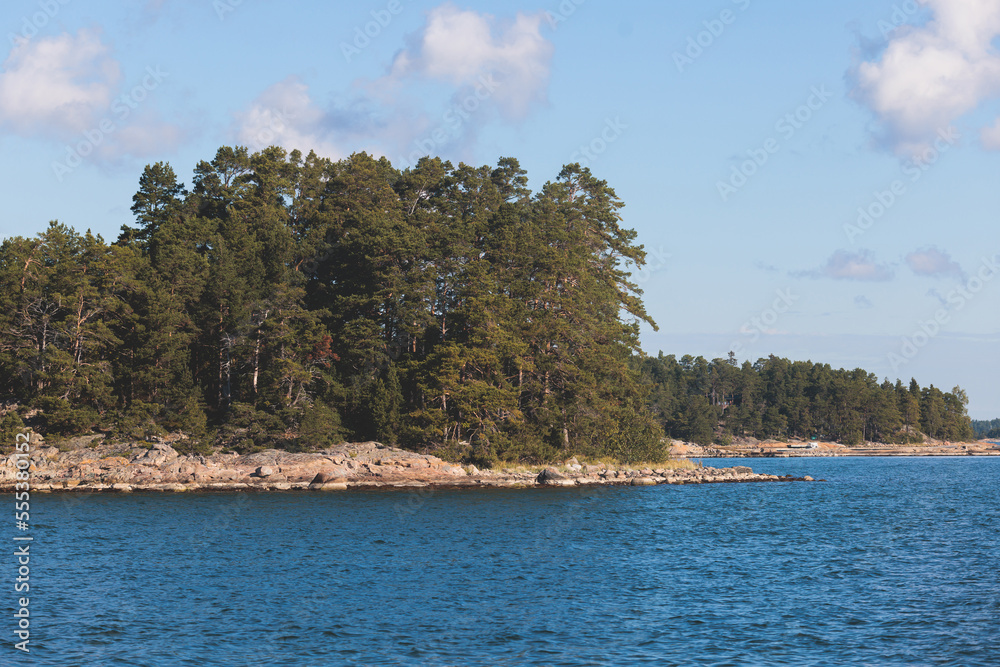 Archipelago National Park landscape, Southwest Finland, with islands, islets and skerries, Saaristomeren kansallispuisto, summer sunny day, view from shuttle ship ferry boat in the Archipelago Sea