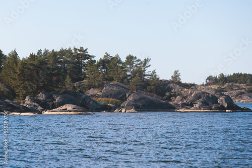 Archipelago National Park landscape, Southwest Finland, with islands, islets and skerries, Saaristomeren kansallispuisto, summer sunny day, view from shuttle ship ferry boat in the Archipelago Sea photo