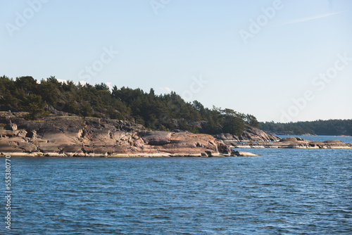 Archipelago National Park landscape, Southwest Finland, with islands, islets and skerries, Saaristomeren kansallispuisto, summer sunny day, view from shuttle ship ferry boat in the Archipelago Sea photo