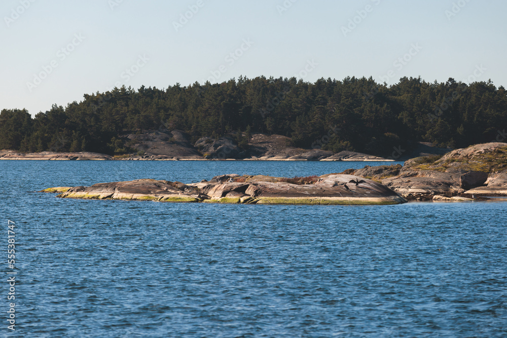 Archipelago National Park landscape, Southwest Finland, with islands, islets and skerries, Saaristomeren kansallispuisto, summer sunny day, view from shuttle ship ferry boat in the Archipelago Sea