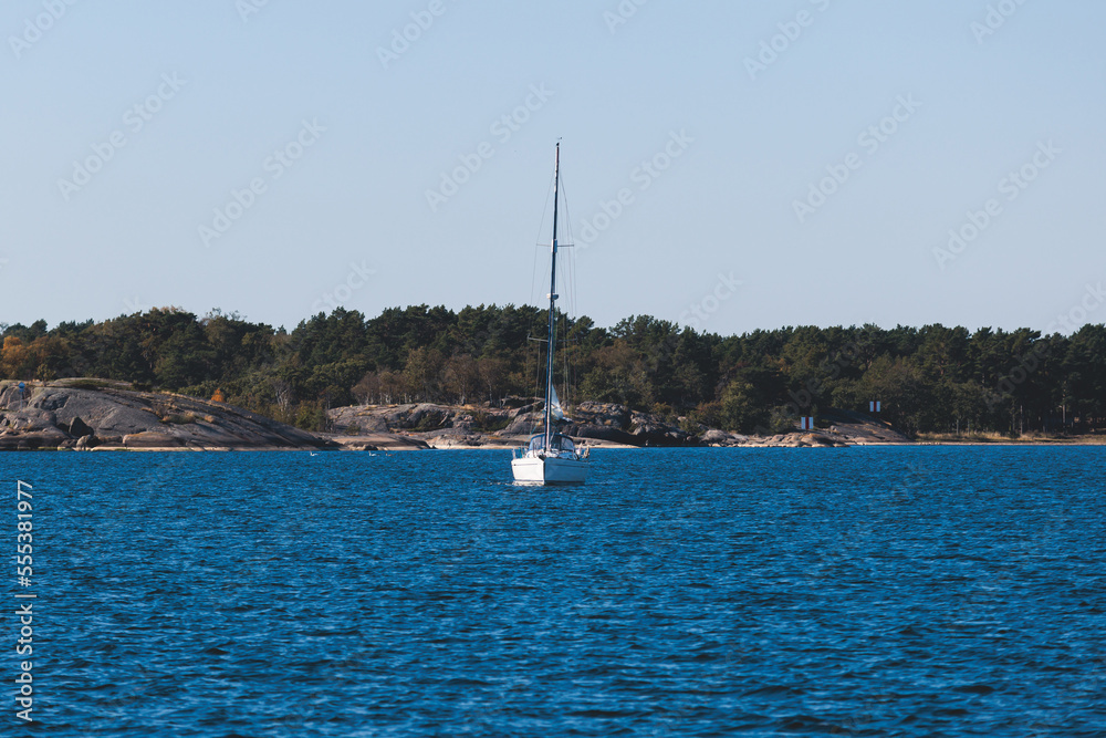 Archipelago National Park landscape, Southwest Finland, with islands, islets and skerries, Saaristomeren kansallispuisto, summer sunny day, view from shuttle ship ferry boat in the Archipelago Sea Archipelago National Park landscape, Southwest Finland, with islands, islets and skerries, Saaristomeren kansallispuisto, summer sunny day, view from shuttle ship ferry boat in the Archipelago Sea