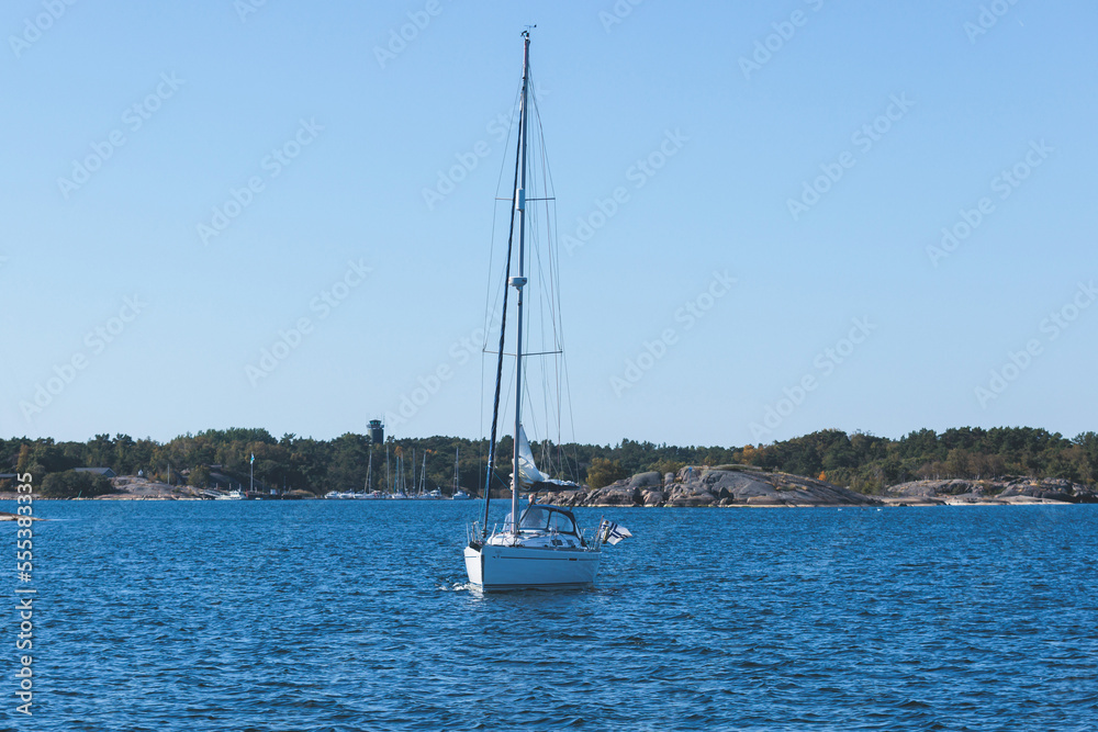 Archipelago National Park landscape, Southwest Finland, with islands, islets and skerries, Saaristomeren kansallispuisto, summer sunny day, view from shuttle ship ferry boat in the Archipelago Sea Archipelago National Park landscape, Southwest Finland, with islands, islets and skerries, Saaristomeren kansallispuisto, summer sunny day, view from shuttle ship ferry boat in the Archipelago Sea