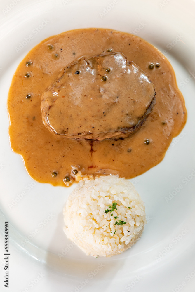 Filet mignon of veal with rice and pepper sauce Stock Photo Adobe Stock