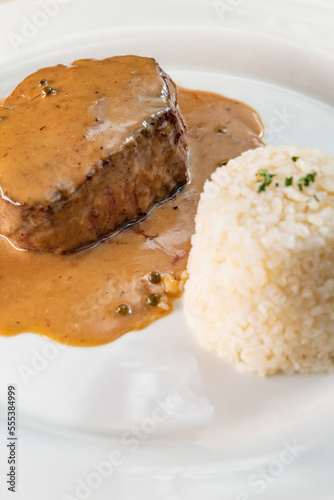 Filet mignon of veal with rice and pepper sauce