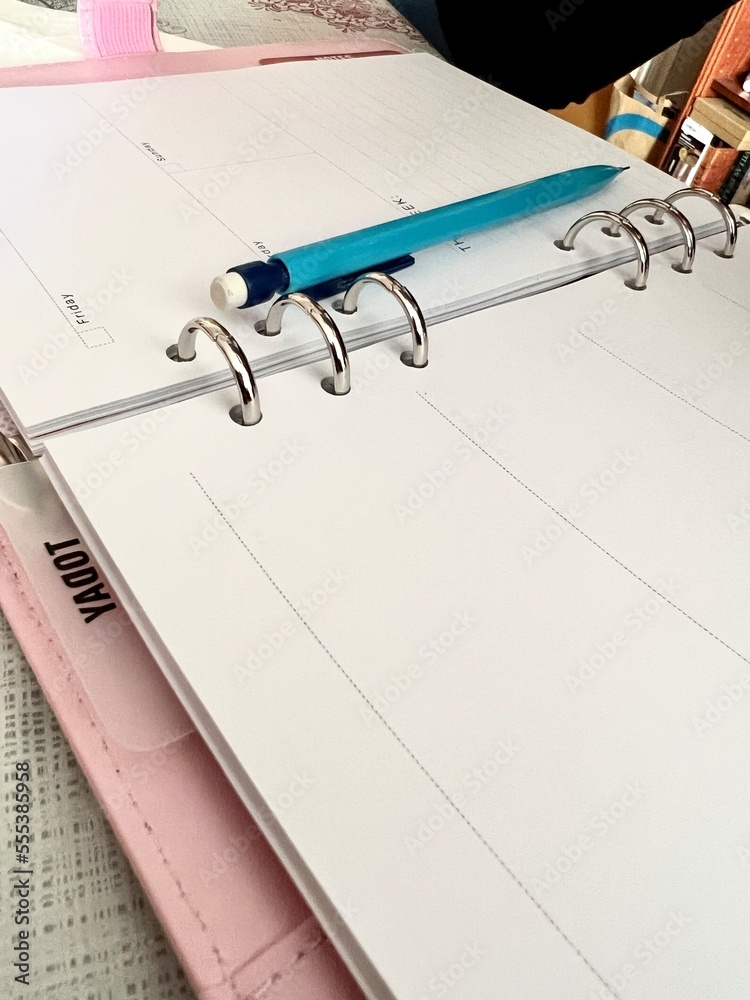 Open diary, planner or notebook. Office and business supplies for lists, reminders, schedules or agendas. Open diary, planner or notebook. Office and business supplies for lists, reminders, schedules or agendas.