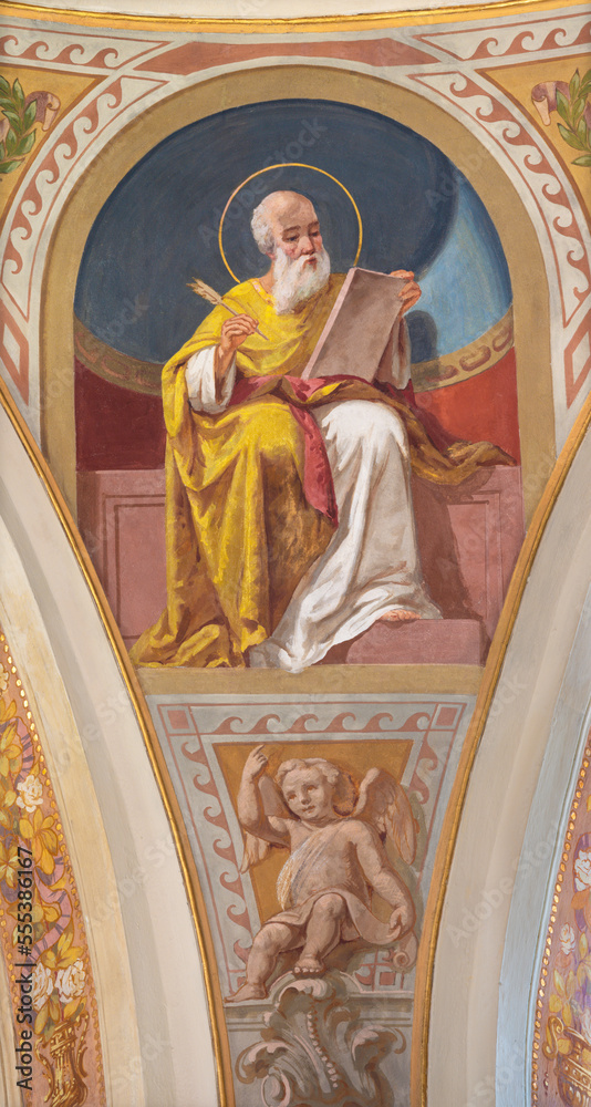 IVREA, ITALY - JULY 15, 2022: The fresco of St. Matthew the Evangelist in cupola of church Chiesa di San Salvatore by Giovanni  Silvestro (1914).