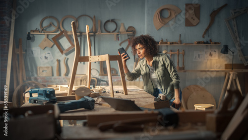 Product Designer Taking a Smartphone Photo of a Wooden Chair Project. Black Creative Female Sending Picture to Her Colleague Online for Feedback and Evaluation.