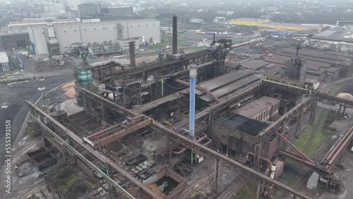 Blast furnice and industrial recycling company. Sintering, zinc production, furnace and casting. Steel industry factory plant. Aerial drone overhead view. Heavy industry in Germany. photo