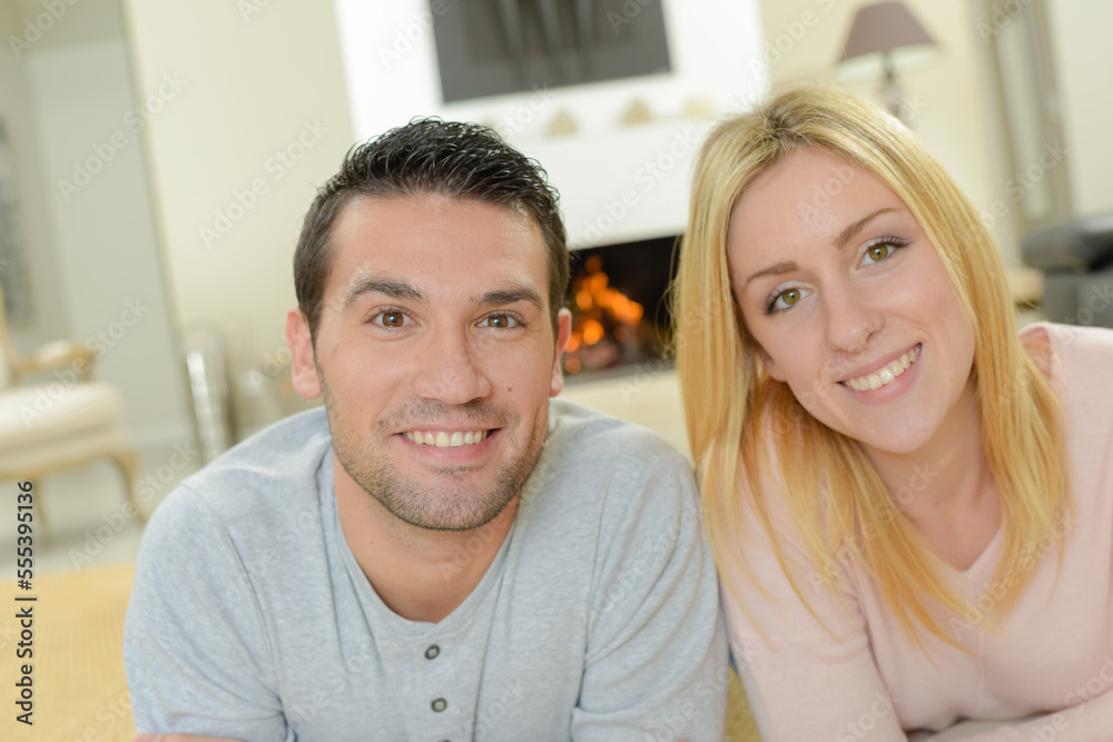 couple is smiling at the camera