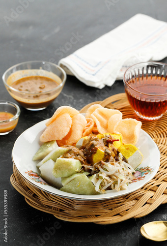 Ketoprak or Kupat Tahu, Compressed Rice Cake or Lontong Served with Tofu photo