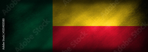 The flag of Benin on a retro background