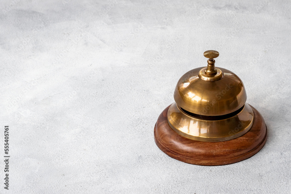 Close up of hotel golden service bell. Attention concept Close up of hotel golden service bell. Attention concept