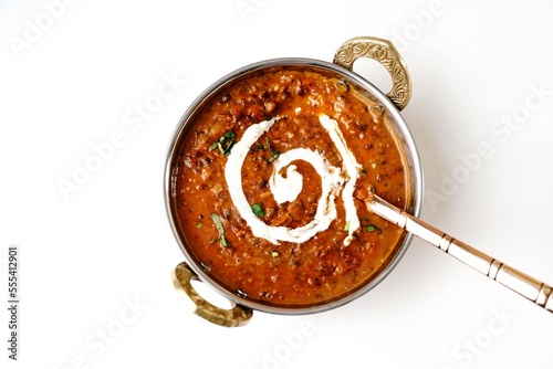 Dal Makhani - Indian black lentil curry isolated on white, selective focus photo