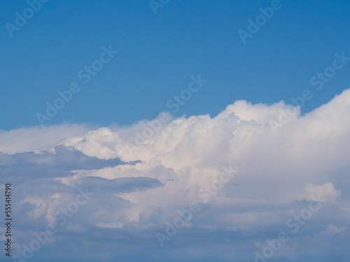 Cloudy sky. Blue sky background with white clouds © Alekskan12