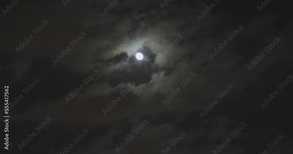 spooky moon in the cloudy night sky spooky moon in the cloudy night sky